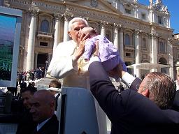Pope Benedict kissing my daughter